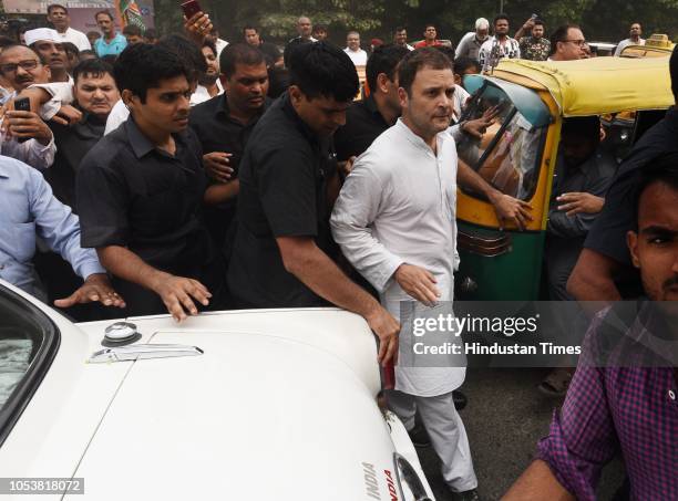 Congress president Rahul Gandhi with his supporters during the protest march at the CBI Headquarter demanding the reinstatement of CBI Director Alok...