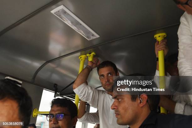 Congress president Rahul Gandhi in the police van as he was detained during the protest march at the CBI Headquarter demanding the reinstatement of...