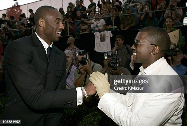 Kobe Bryant and Kanye West during 32nd Annual American Music Awards - Red Carpet at Shrine Auditorium in Los Angeles, California, United States.