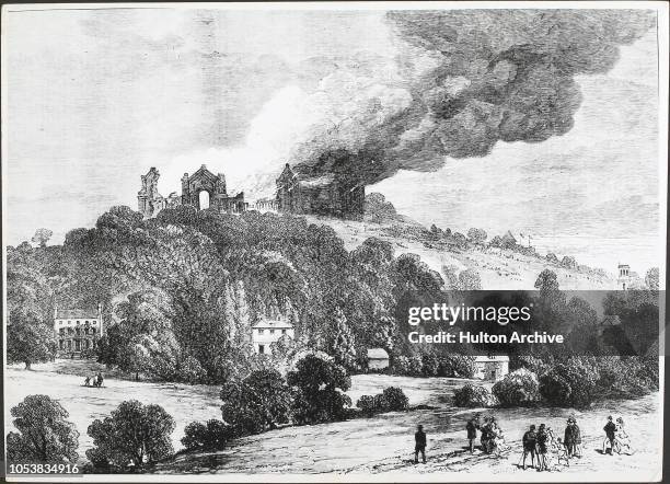 The fire at Alexandra Palace, London, England, as seen from a distant hilltop.