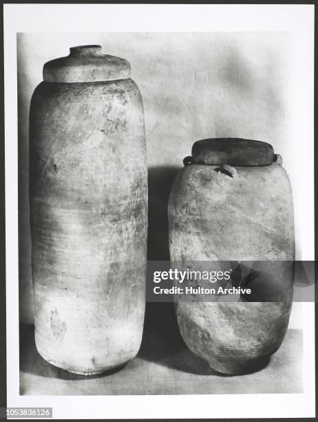 The two earthenware jars in which the Dead Sea Scrolls were found. The 2,000 year old scroll from Book of Isaiah, A 2,000 year old Jewish scroll, an...