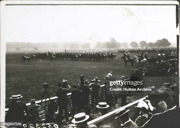 The King reviews Household Cavalry in Windsor Park, June 1913, Cavalry galloping past his Saluting base, Windsor.