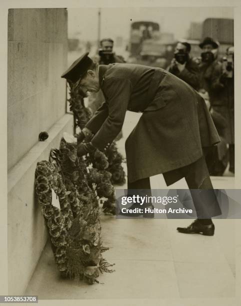 War chiefs placed their wreaths on the Cenotaph in Whitehall to-day, November 11th. - Air Chief Marshal Sir Charles Portal plading the R.A.F wreath...