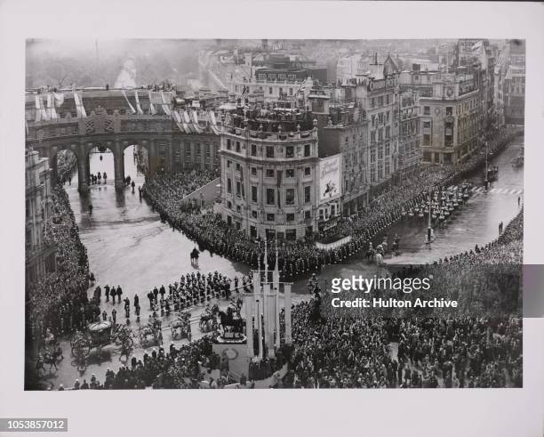 General view of the scene at the bottom end of Trafalgar Square as the Queen 's coach comes along on the beginning of her tour of London after her...