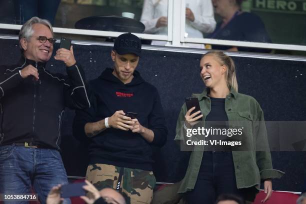 Nicky Romero, Nick Rotteveel, Girlfriend during the UEFA Champions League group E match between Ajax Amsterdam and SL Benfica at the Johan Cruijff...