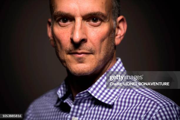 Lawyer and Chief Executive Officer of the United States Anti-Doping Agency Travis Tygart poses during a photo session on October 26, 2018 in Paris. -...