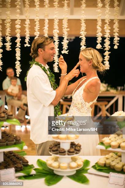 Bethany Hamilton and Adam Dirks are seen during their wedding August 18, 2013 in Princeville, Hawaii.
