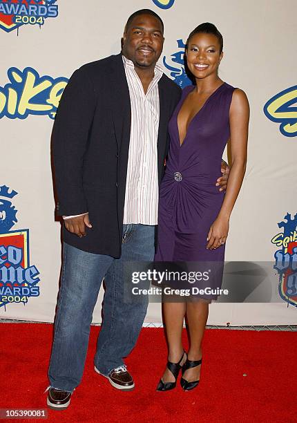 Chris Howard and Gabrielle Union during Spike TV Video Game Awards 2004 - Arrivals at Barker Hangar in Santa Monica, California, United States.