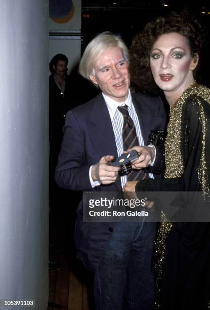 Andy Warhol and Holly Woodlawn during Fiorucci Disco Party at Fiorucci Boutique in New York City, New York, United States.