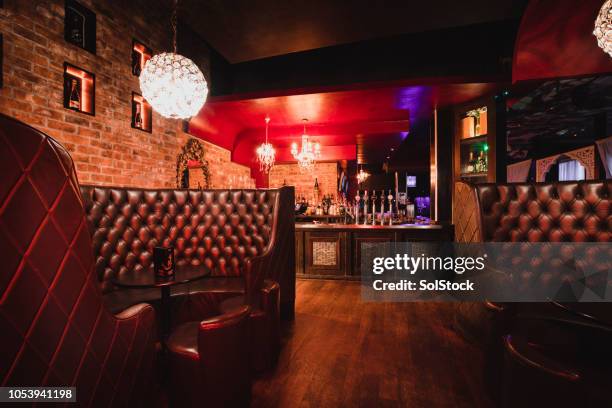 empty nightclub at night - bar wall stock pictures, royalty-free photos & images