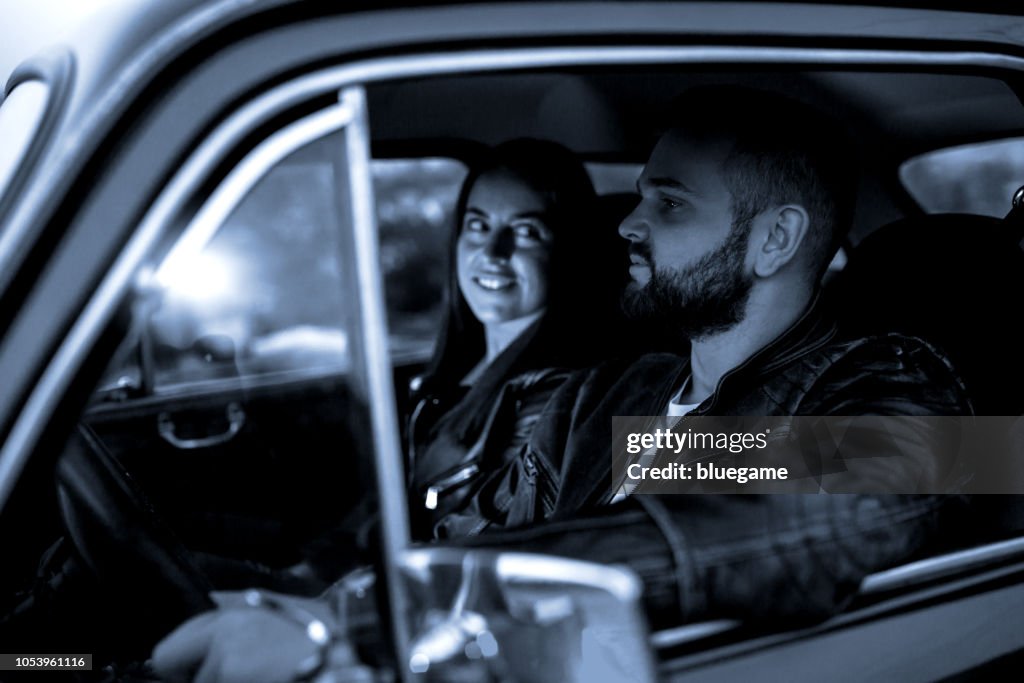 Young Couple Trip With Vintage Car