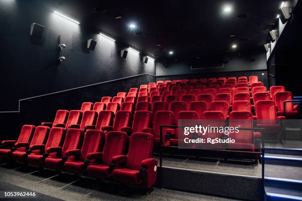 empty rows of red seats - auditorium seats stock pictures, royalty-free photos & images