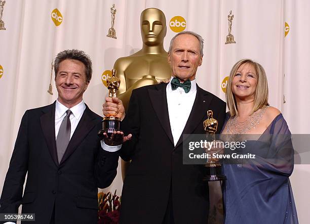 Clint Eastwood, winner Best Director for "Million Dollar Baby" and Best Picture for "Million Dollar Baby" with Dustin Hoffman and Barbra Streisand