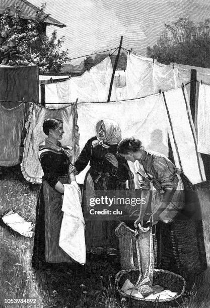 three women exchange news while hanging up the laundry outdoor - hanging laundry stock illustrations