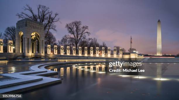 national world war ii memorial - washington, dc - washington dc skyline night stock pictures, royalty-free photos & images