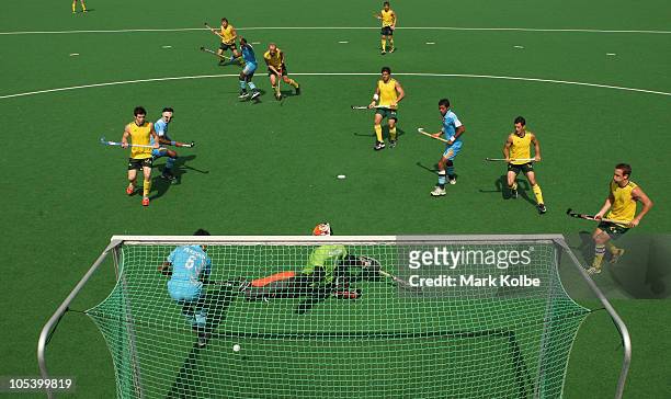 Luke Doerner of Australia scores a goal during the Men's Gold medal match between Australia and India at the Major Dhyan Chand National Stadium...