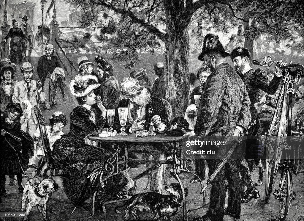 People in a bavarian beergarden, having fun