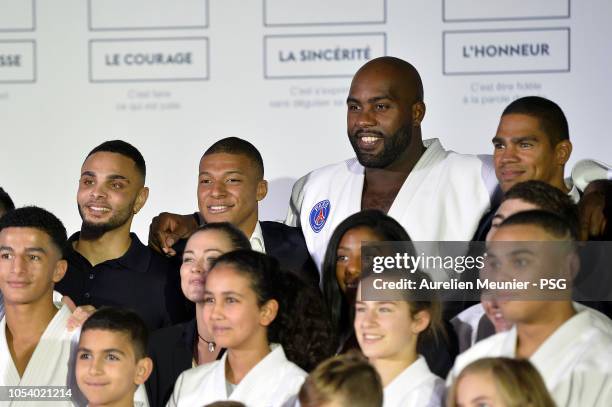 Layvin Kurzawa, Kylian Mbappe, Teddy Riner and Daniel Narcisse attend the inauguration of the Paris Saint-Germain judo new dojo on October 26, 2018...