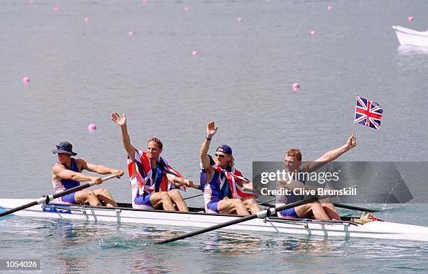 James Cracknell, Steve Redgrave, Tim Foster and Matthew Pinsent of Great Britain celebrate gold in the Men's Coxless Four Rowing Final at the Sydney...