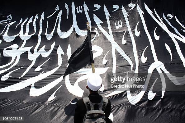 Tauheed Flag Indonesian Muslims carrying Tawheed flags and other attributes staged ...
