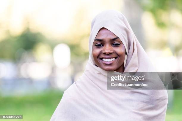 muslim black young woman - beautiful nigerian women stock pictures, royalty-free photos & images