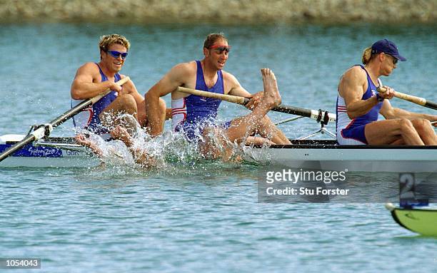 Matthew Pinsent falls into the water whilst celebrating gold in the Men's Coxless Four Rowing Final alongside Great Britain team mates James...