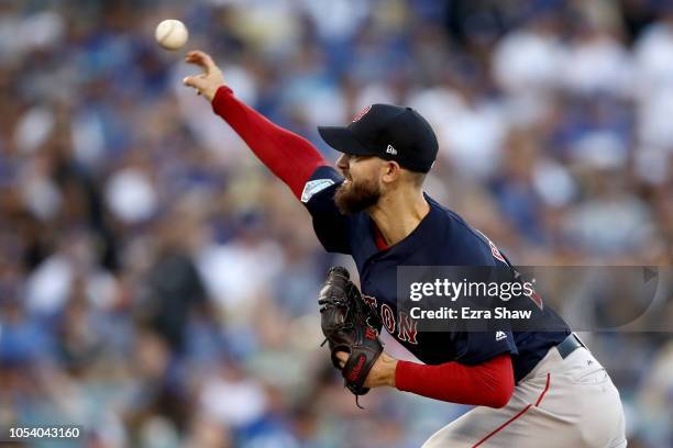 Rick Porcello of the Boston Red Sox delivers the pitch during the first inning against the Los Angeles Dodgers in Game Three of the 2018 World Series...