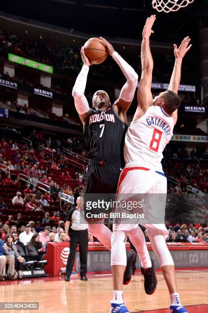 Carmelo Anthony of the Houston Rockets goes to the basket against the LA Clippers on October 26, 2018 at the Toyota Center in Houston, Texas. NOTE TO...