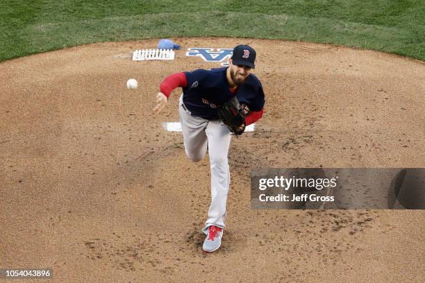 Rick Porcello of the Boston Red Sox delivers the pitch during the first inning against the Los Angeles Dodgers in Game Three of the 2018 World Series...
