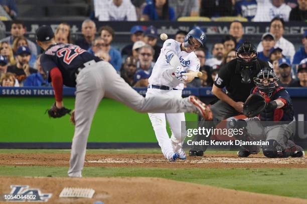 Joc Pederson of the Los Angeles Dodgers hits a third inning home run on a pitch from Rick Porcello of the Boston Red Sox in Game Three of the 2018...