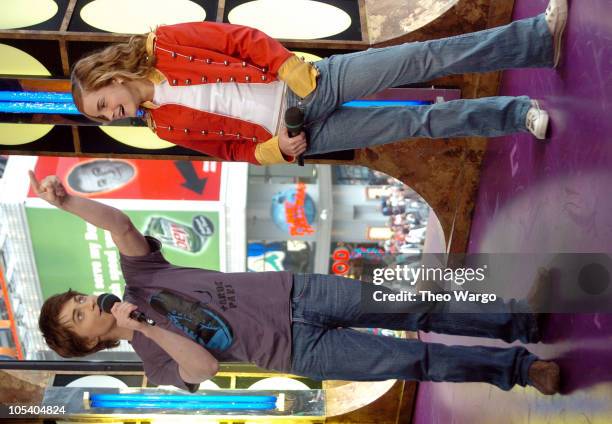 Daniel Radcliffe and Emma Watson during Daniel Radcliffe and Emma Watson Visit MTV's "TRL" - May 24, 2004 at MTV Studios, Times Square in New York...