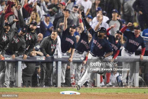 Jackie Bradley Jr. #19 of the Boston Red Sox celebrates his eighth inning home run against the Los Angeles Dodgers in Game Three of the 2018 World...