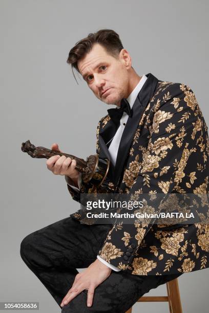 Jim Carrey, recipient of the Charlie Chaplin Britannia Award for Excellence in Comedy, poses in the portrait studio at the 2018 British Academy...