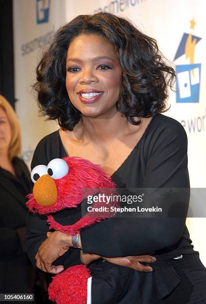 Oprah Winfrey and Elmo during 2nd Annual "Sesame Street" Workshop Gala at Cipriani's in New York City, New York, United States.