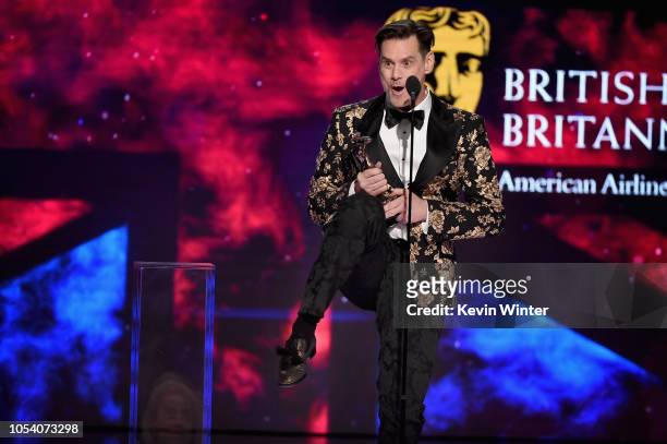 Jim Carrey accepts the Charlie Chaplin Britannia Award for Excellence in Comedy presented by Jaguar Land Rover onstage at the 2018 British Academy...