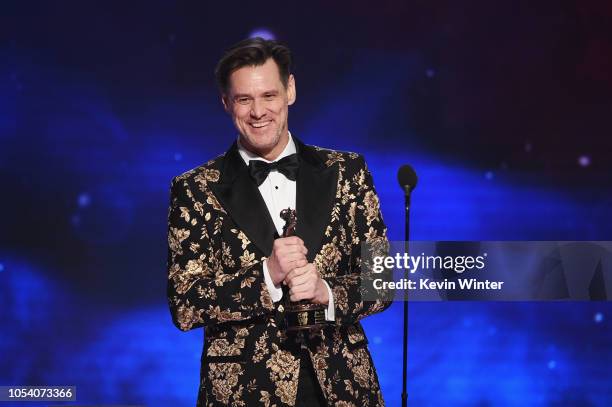 Jim Carrey accepts the Charlie Chaplin Britannia Award for Excellence in Comedy presented by Jaguar Land Rover onstage at the 2018 British Academy...