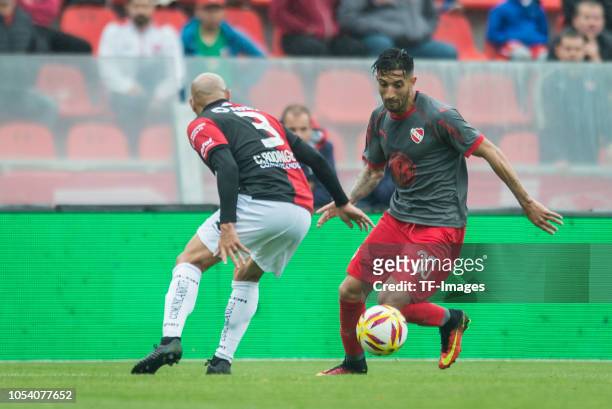 Clemente Rodriguez of Colon and Gonzalo Veron of Independiente battle for the ball during a match between Independiente and Colon as part of...