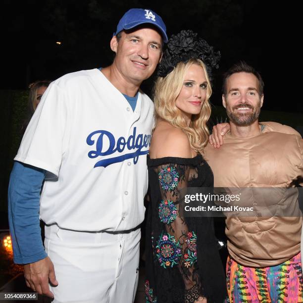 Scott Stuber, Molly Sims, and Will Forte attend the Casamigos Halloween Party on October 26, 2018 in Beverly Hills, California.