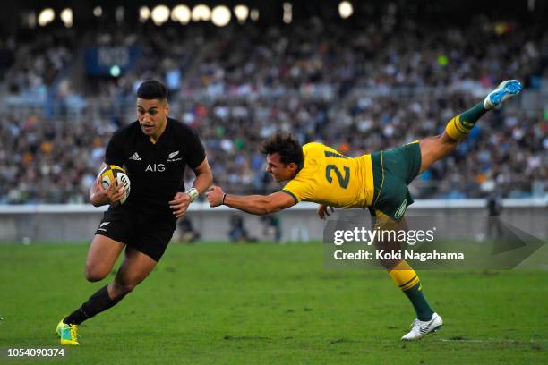 Rieko Ioane of the All Blacks goes past Nick Phipps of the Wallabies during the Bledisloe Cup Bledisloe Cup test match between New Zealand All Blacks...