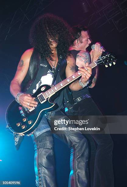 Slash and Scott Weiland of Velvet Revolver during Velvet Revolver In Concert at Roseland - May 26, 2004 at Roseland in New York City, New York,...