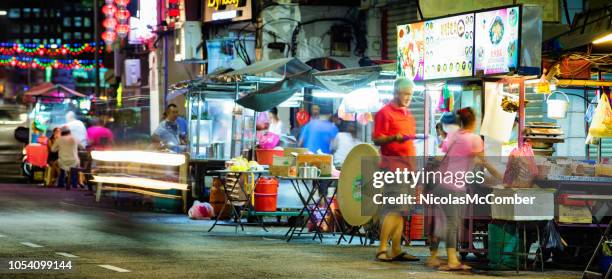 night food carts in penang's george town panorama - penang state stock pictures, royalty-free photos & images