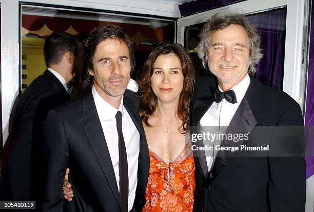 Walter Salles, Rebecca Yeldman and Curtis Hanson during 2004 Cannes Film Festival -"Motorcycle Diaries" - Party at La Plage Coste in Cannes, France.