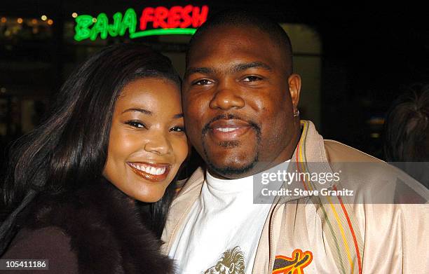 Gabrielle Union and Chris Howard during "Coach Carter" Los Angeles Premiere - Arrivals at Grauman's Chinese Theatre in Hollywood, California, United...