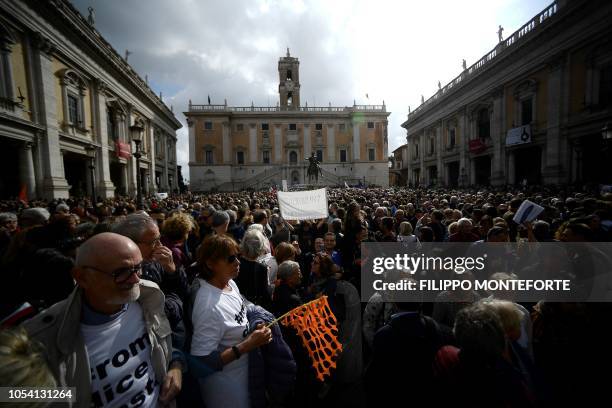 Demonstrators gather in Rome 's Piazza del Campidoglio, on October 27, 2018 to protest against the current decay of the capital under the populist...