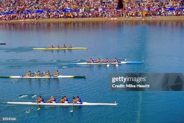 James Cracknell, Steve Redgrave, Tim Foster and Matthew Pinsent of Great Britain cross the line to win Gold in the Men's Coxless Four Rowing Final...