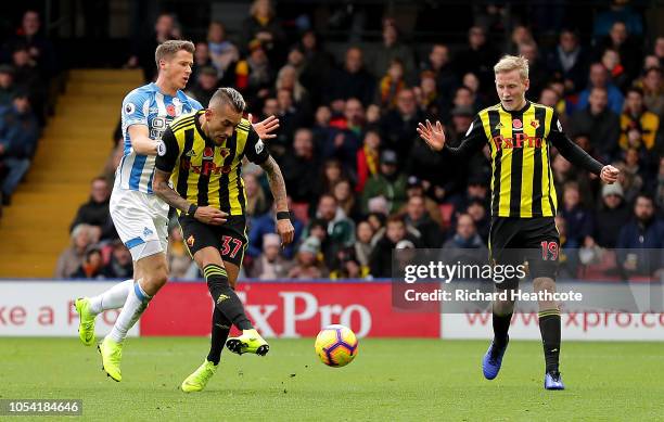 Roberto Pereyra of Watford scores his team's first goal during the Premier League match between Watford FC and Huddersfield Town at Vicarage Road on...