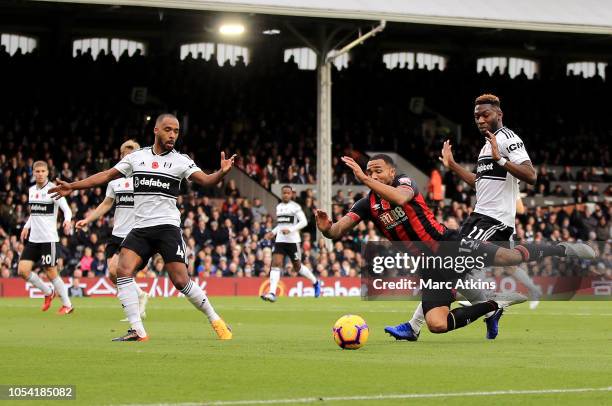 Callum Wilson of AFC Bournemouth is fouled by Timothy Fosu-Mensah of Fulham inside the penalty area, leading to Bournemouth being awarded a penalty,...