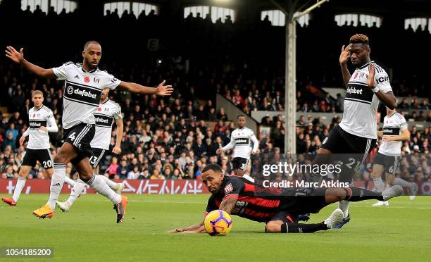 Callum Wilson of AFC Bournemouth is fouled by Timothy Fosu-Mensah of Fulham inside the penalty area, leading to Bournemouth being awarded a penalty,...