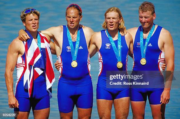 James Cracknell, Steve Redgrave, Tim Foster and Matthew Pinsent of Great Britain celebrate gold in the Men's Coxless Four Rowing Final at the Sydney...