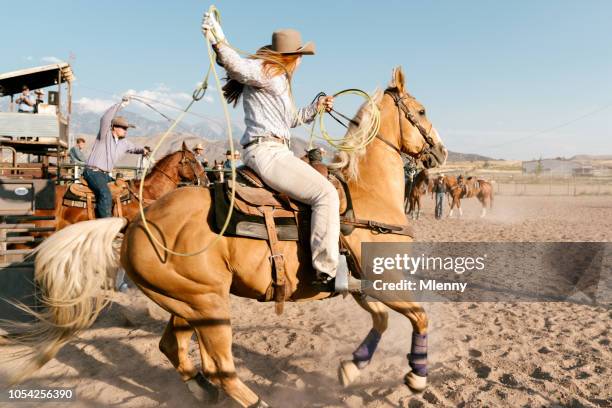 Cowgirl With Lasso Starting Into Rodeo Arena High-Res Stock Photo ...